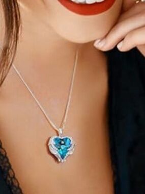 Amazon Silver Ocean Heart Necklace with Blue Gemstone Pendant